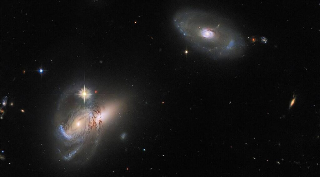 Hubble image of galactic trio illustrates how complex and diverse galaxies are